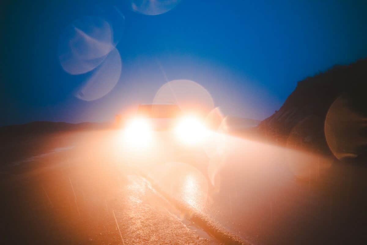 Bright car headlights at night