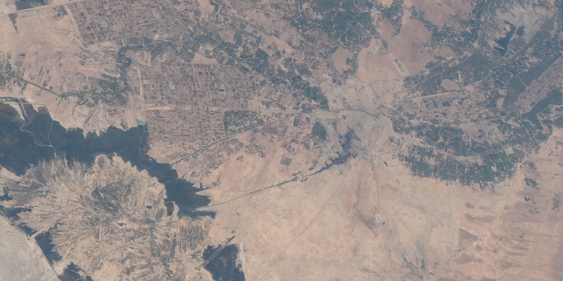 NASA ISS satellite view of Khuzestan province, Iran, showing the Karun River near Ahvaz — Darkhovin nuclear power plant lies seventy kilometres south of Ahvaz on the same river