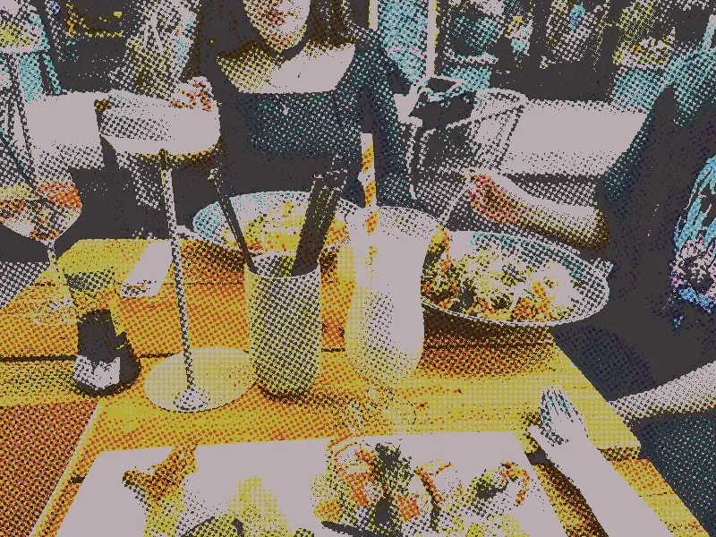 my friends at a restaurant, the colors are normal-ish (not pink), except it's a bunch of dots