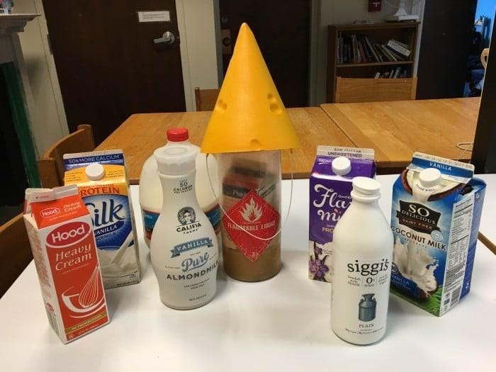 A group of dairy products on a table AI-generated content may be incorrect.