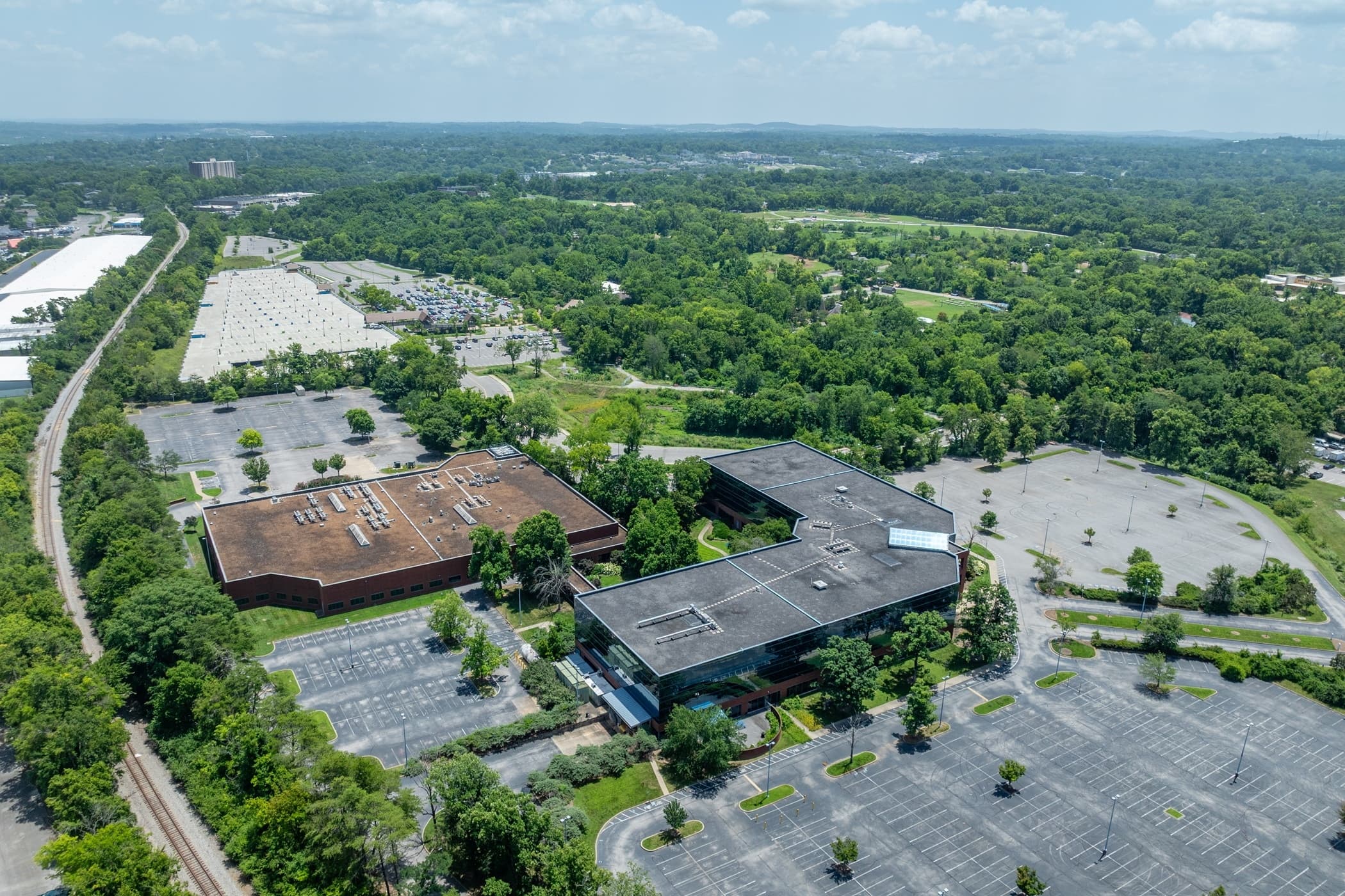Nashville officials are seeking to acquire property currently housing office buildings where a data center is proposed, near a regional zoo. (Chase Brock/CoStar)