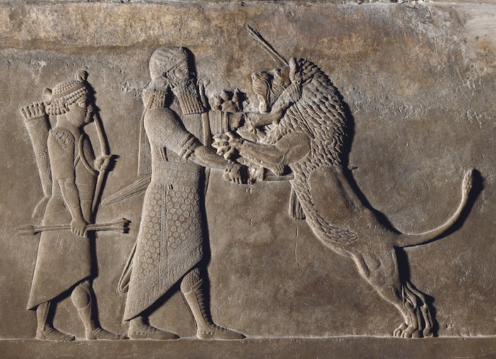 Ashurbanipal killing a lion. Relief from the North Palace, Nineveh. Trustees of the British Museum.