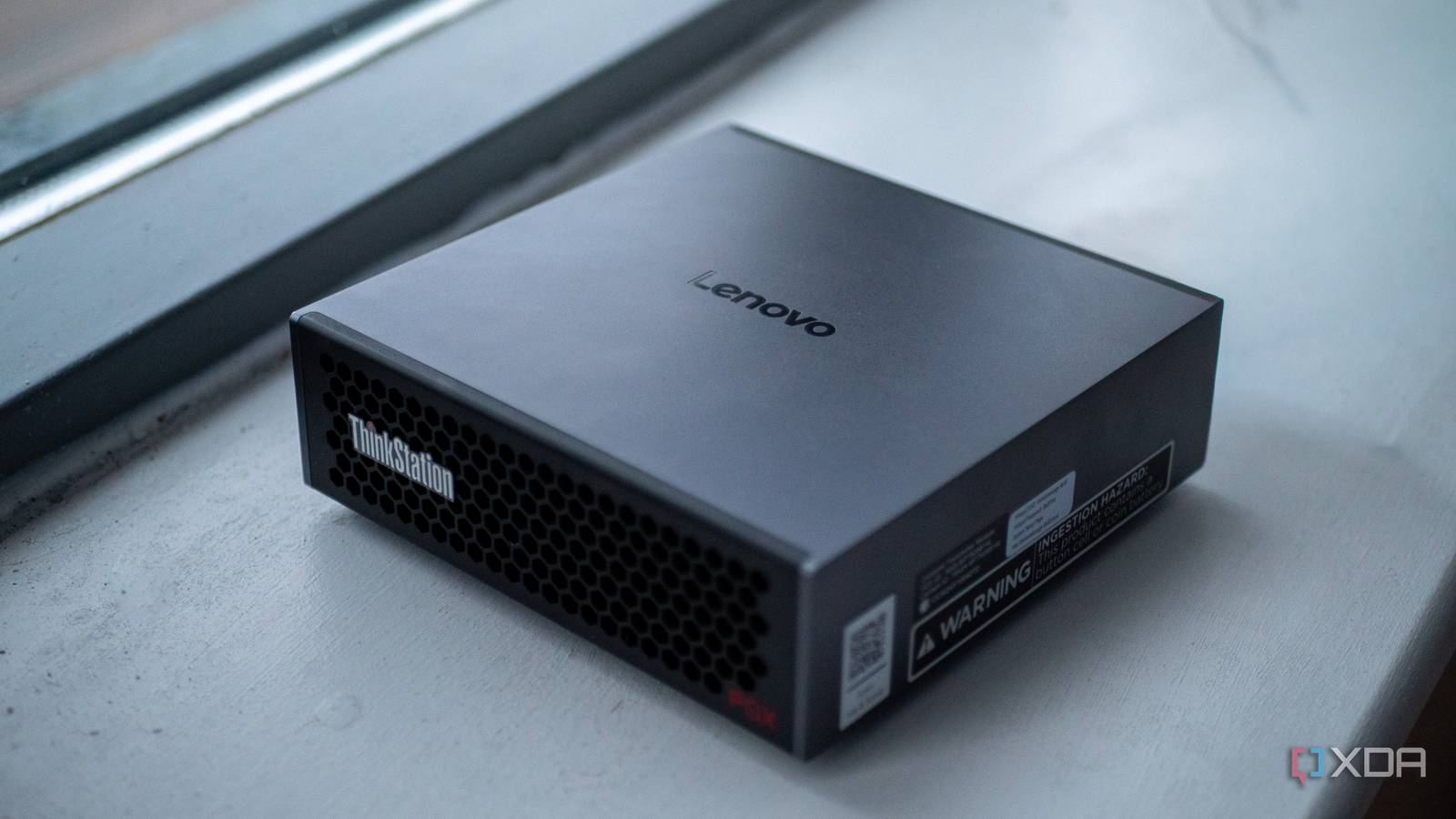 Lenovo Thinkstation PGX on a windowsill, showing the Lenovo logo