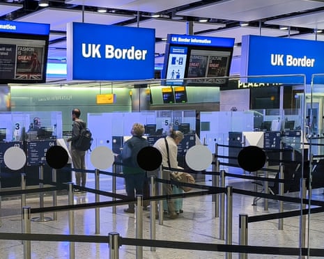 UK Border sign at the arrivals passport control and visa area of London Heathrow airport