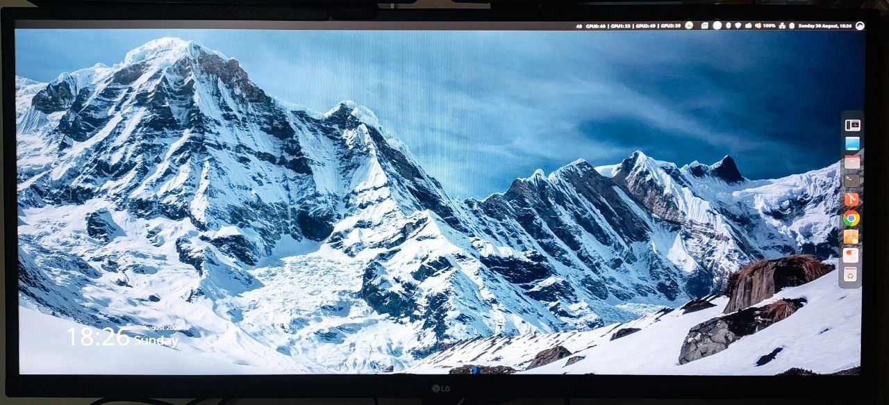 The monitor stretching the SM750 scanout across its physical ultrawide panel