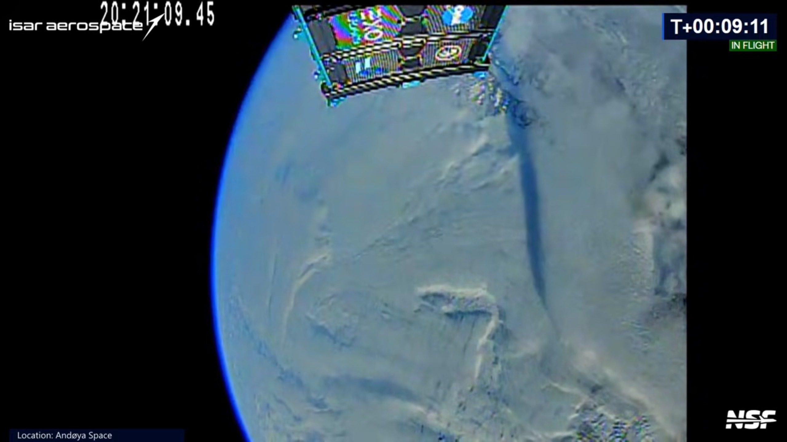 view from a rocket stage looking down at a cloudy earth