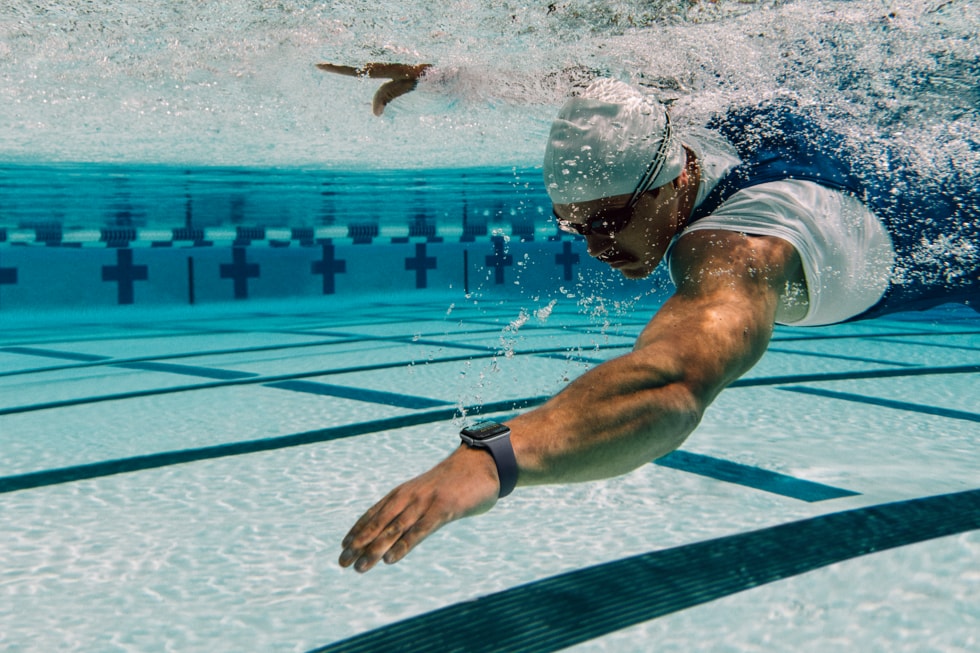 An Apple Watch Series 12 user is shown swimming in a pool.